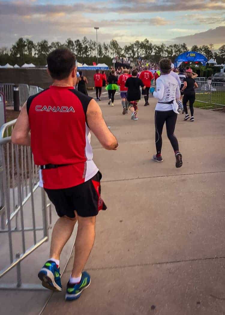 runDisney-10K-run-Hubby-approaching-the-finish-line